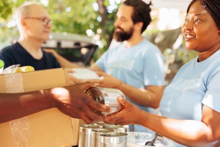 Volunteers organizing food donations at a local food bank for families in need